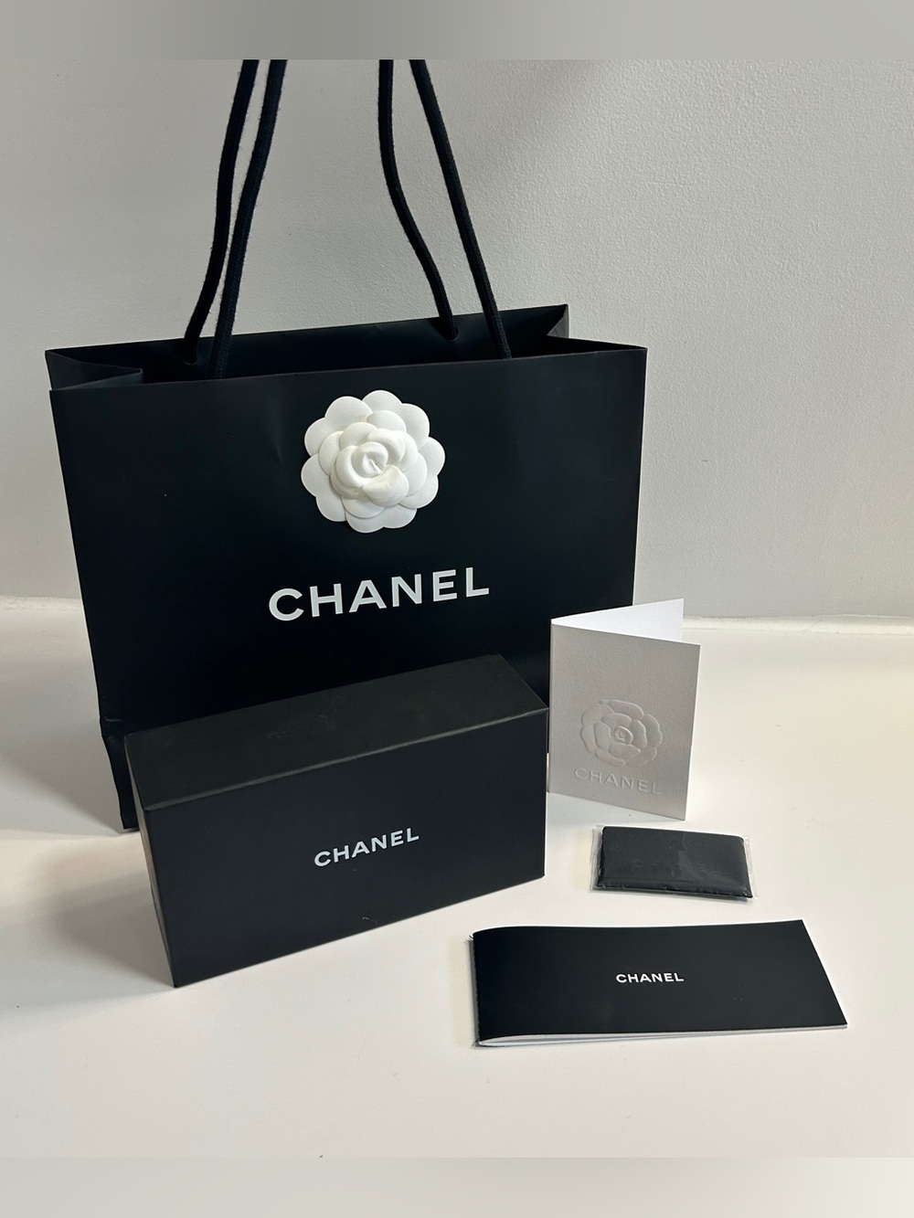 CHANEL Empty Black Gift Bag and Sunglasses Box with Glass Cleaner Cloth and Book